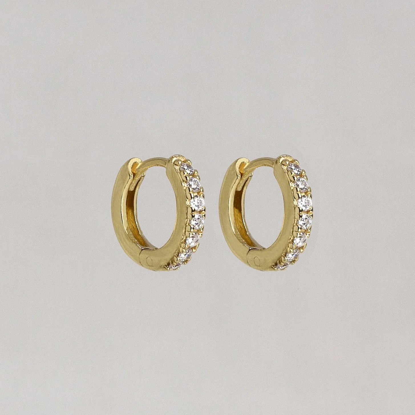 Gold and Black Huggie Hoop Earrings - Image 2