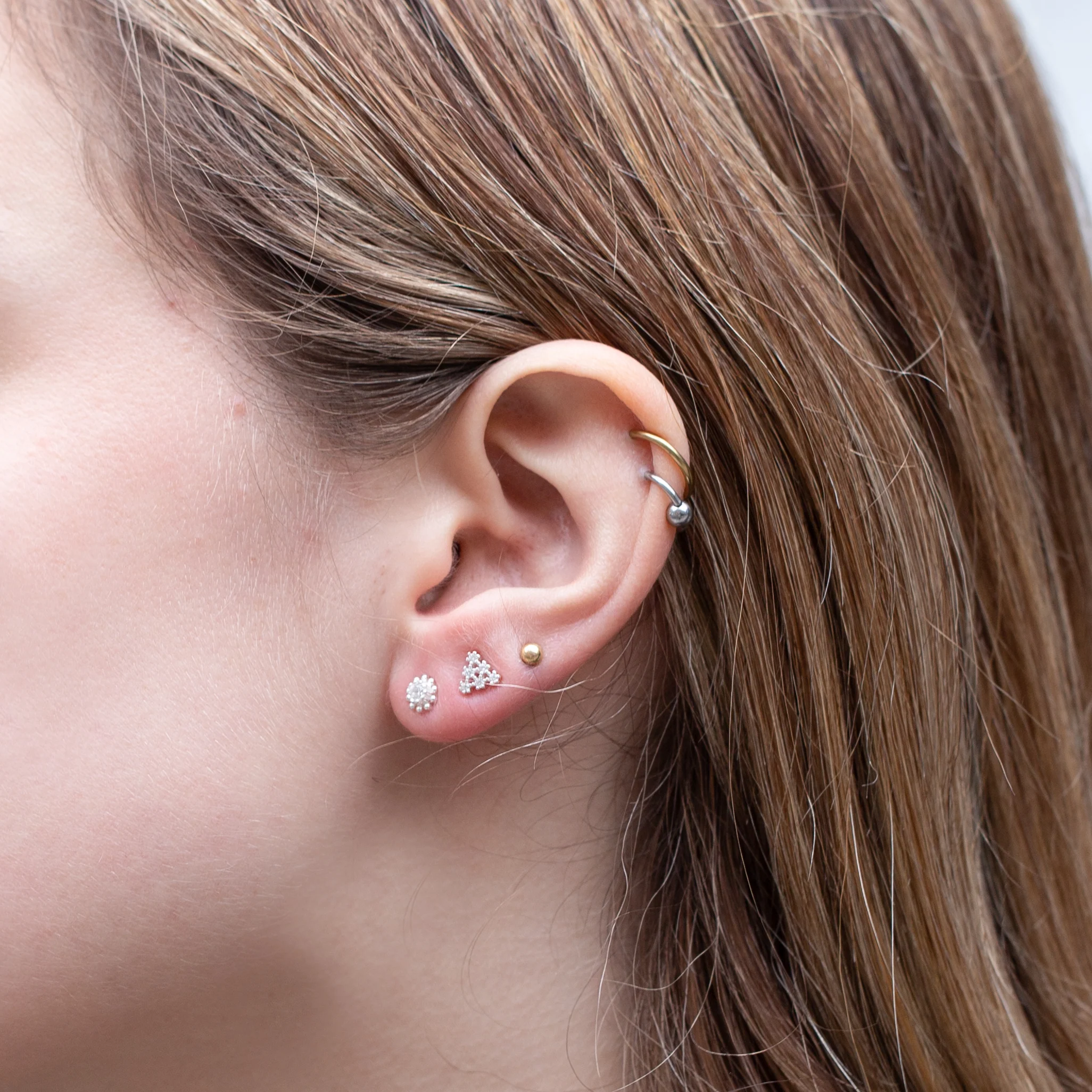 Silver Flower Stud Cartilage Earrings with Cubic Zirconia - Image 2