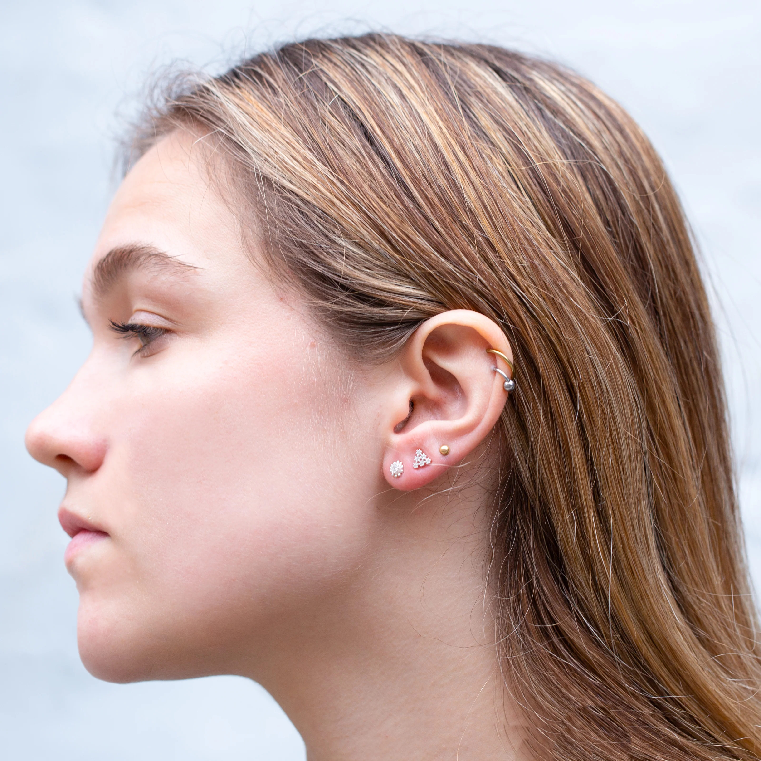 Silver Flower Stud Cartilage Earrings with Cubic Zirconia - Image 4