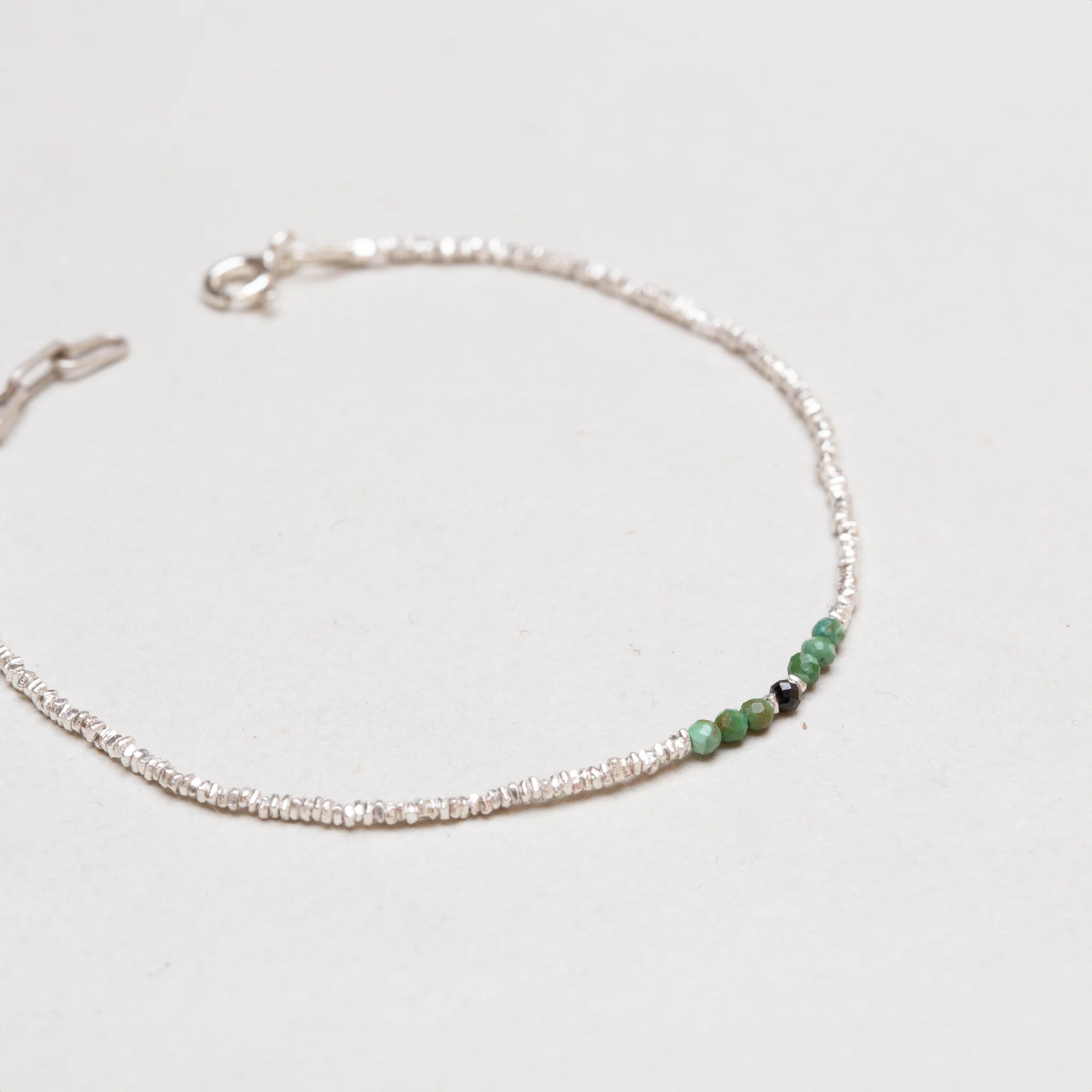 Silver Beads Bracelet with Green and Black Gemstone