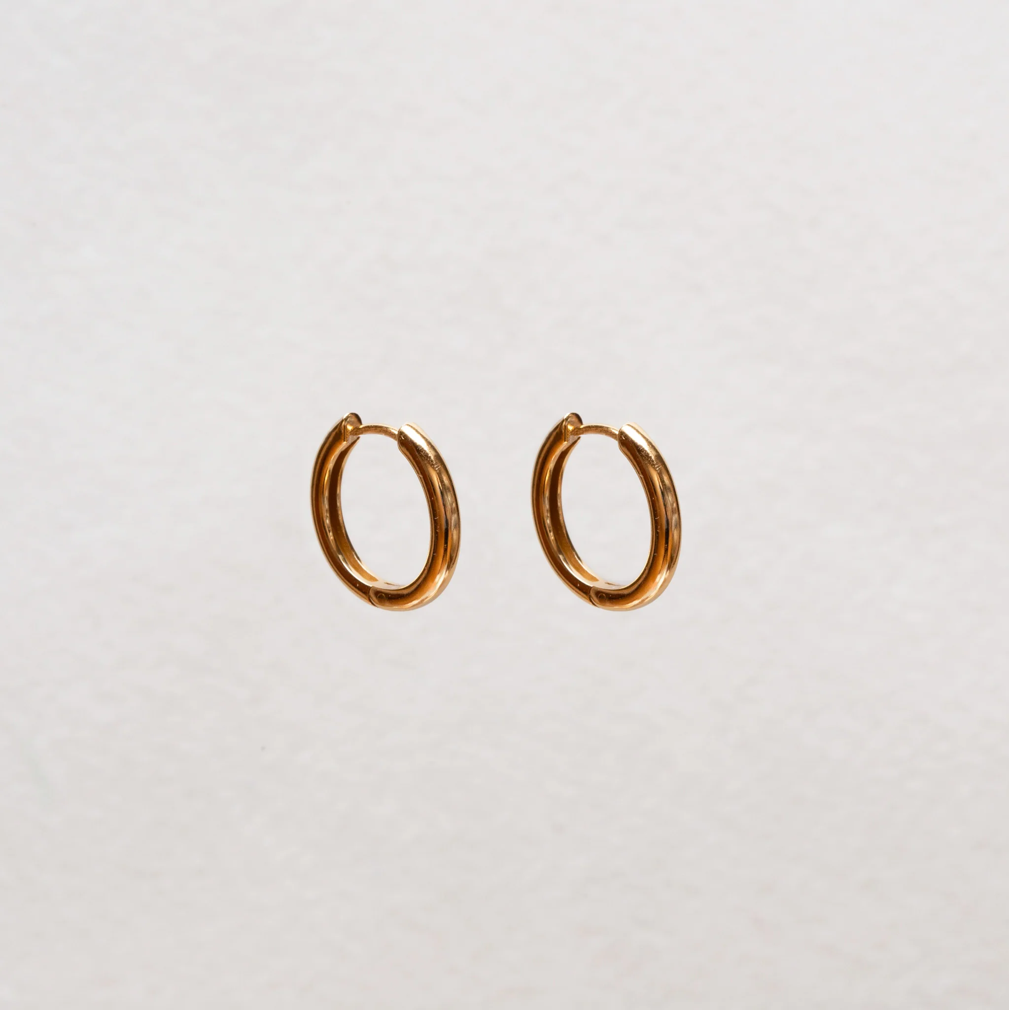 Simple Gold Huggie Hoop Earrings - Image 3