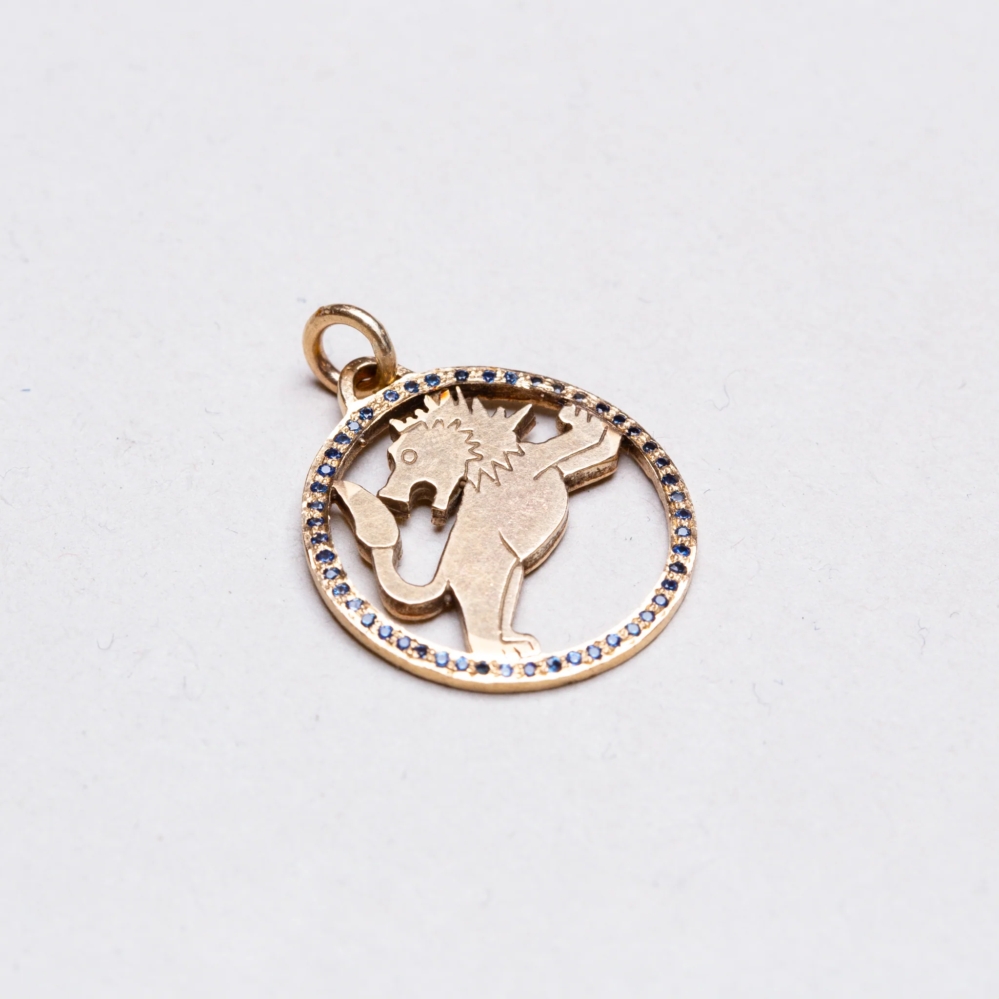 Vintage 9ct Gold Leo Pendant Charm with Sapphires